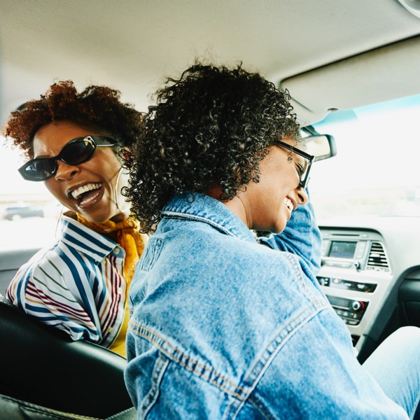 Two people in a car.