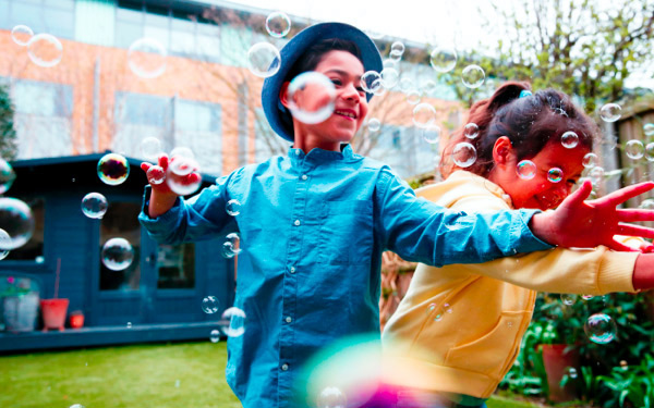 Children playing with bubbles
