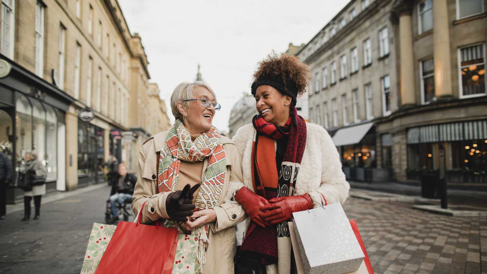 Two women shopping on the highstreet
