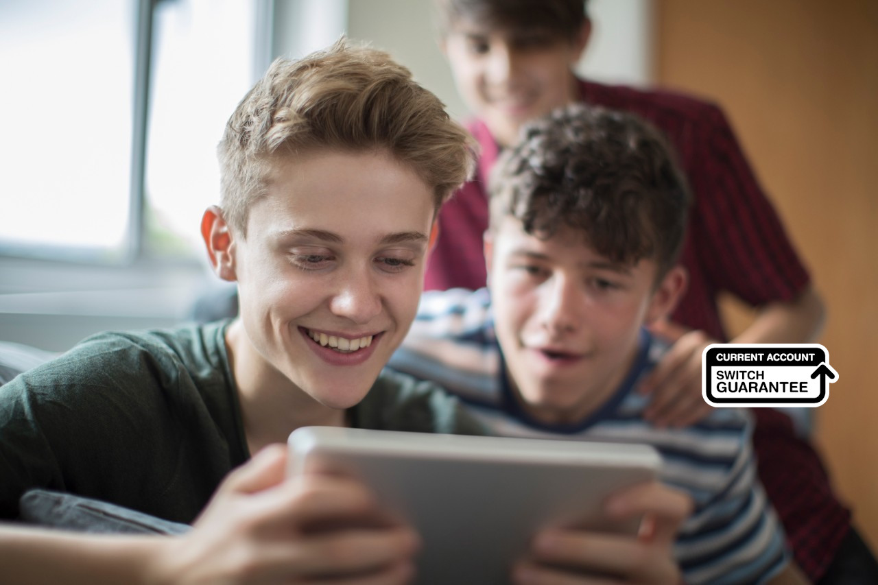 Kids looking at phone