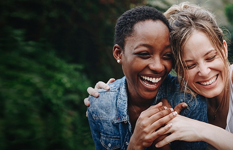 Two people laughing