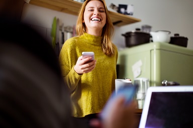 man and woman lying on floor laughing