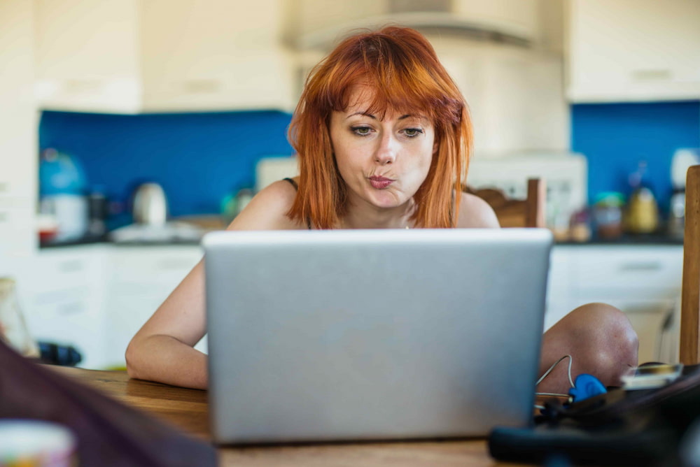 Someone using a laptop.