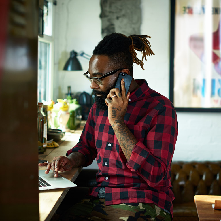 Man talking on mobile phone.