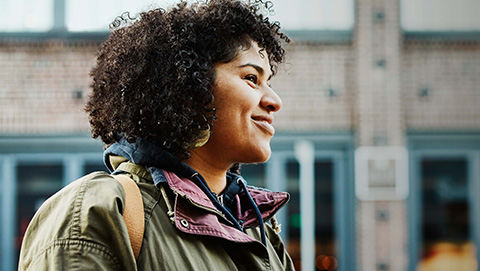 A young lady smiling.