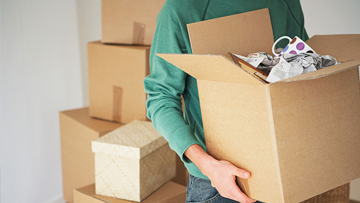 person carrying boxes