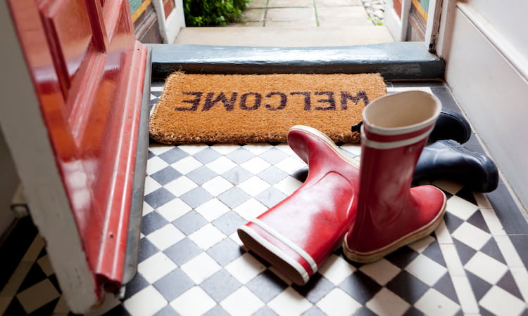 wellington boots in a hallway