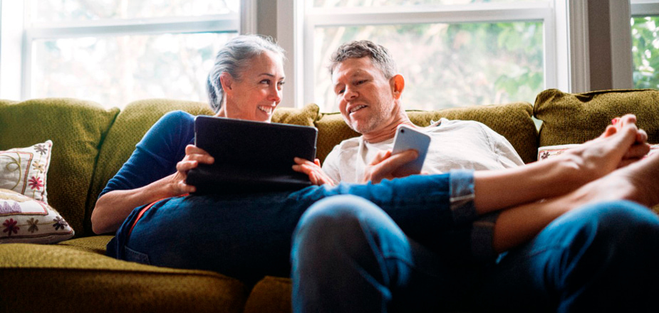 Men and woment looking at notepad