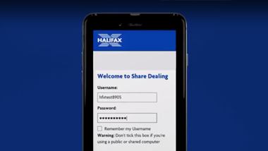 Mobile phone image with Share Dealing sign in screen