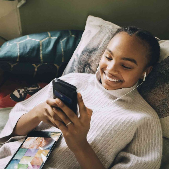 A person using their mobile device.