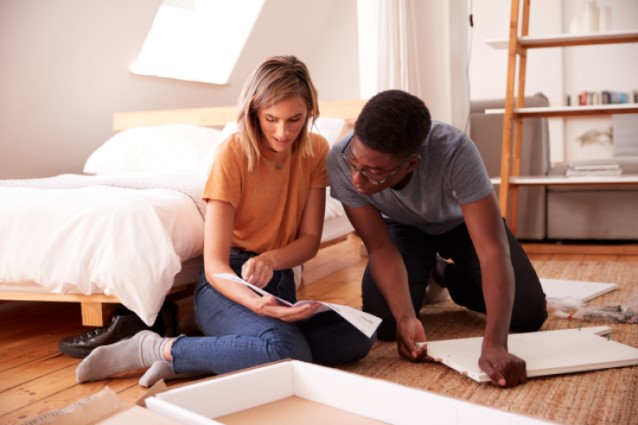 Young couple in loft conversion