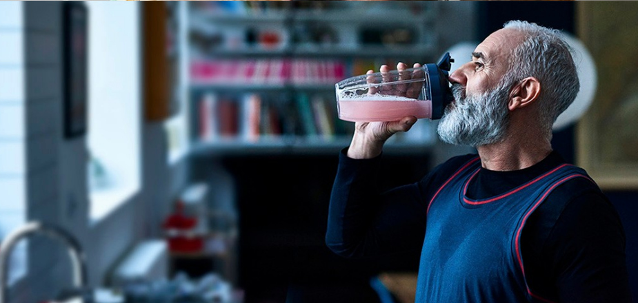 Image of man drinking a smoothie