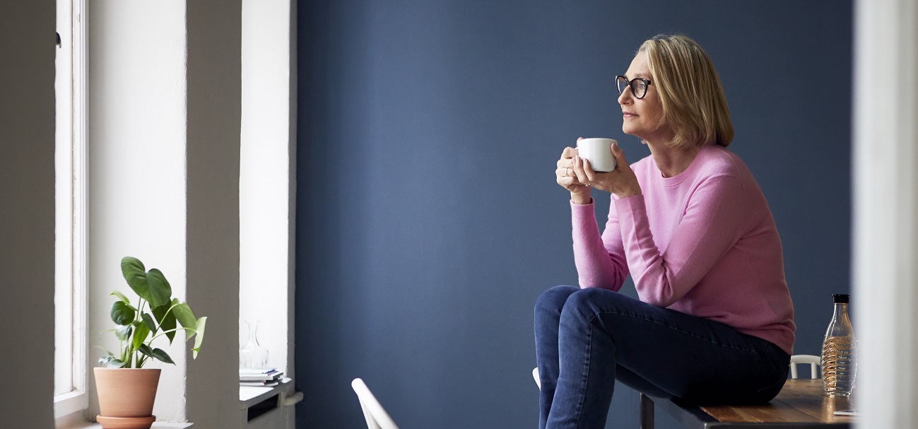 An image of a lady drinking coffee.