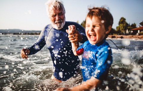 grandfather in see with grandchild